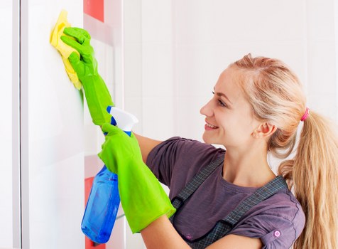 Carpet cleaning team preparing equipment safely before a service