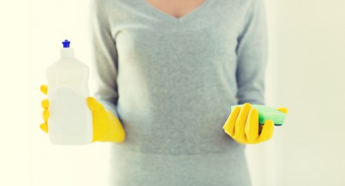 Professional cleaning team working through a Southkensington move-out property